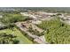 Aerial view of real estate showcasing lush surroundings and nearby shopping centers at 14625 Par Club Cir # 14625, Tampa, FL 33618
