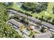 This aerial view showcases the community pool, water features and manicured grounds at 14625 Par Club Cir # 14625, Tampa, FL 33618