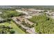 Aerial view of real estate showcasing lush surroundings and nearby shopping centers at 14625 Par Club Cir # 14625, Tampa, FL 33618