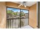 Balcony overlooking canal and courtyard of townhome complex, view of lush landscaping and neighboring buildings at 14625 Par Club Cir # 14625, Tampa, FL 33618