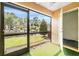 Enclosed patio features artificial turf and a relaxing water view at 14625 Par Club Cir # 14625, Tampa, FL 33618