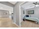 Well-lit bedroom with modern ceiling fan, charming artwork, and comfortable single bed at 18164 Turning Leaf Cir, Land O Lakes, FL 34638