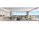 Spacious open-concept living and dining area with floor-to-ceiling windows and stunning views at 235 1St S Ave # 2502, St Petersburg, FL 33701