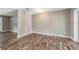A shot of the dining room and the consistent flooring, wall colors, and light fixtures at 2612 Lenna Ave, Seffner, FL 33584