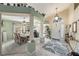 Welcoming foyer featuring high ceilings, elegant columns, and an open layout to the dining area at 371 Quane Ave, Spring Hill, FL 34609