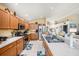 Functional kitchen with ample counter space, wooden cabinets, and modern stainless steel appliances at 371 Quane Ave, Spring Hill, FL 34609