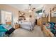 Inviting main bedroom with a sloped ceiling, neutral tones, and ensuite bathroom access at 371 Quane Ave, Spring Hill, FL 34609