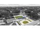 Aerial view of property at 3909 W Oklahoma Ave Tampa, FL 33616, surrounded by lush trees at 3909 W Oklahoma Ave, Tampa, FL 33616