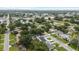 Aerial view of the home at 3909 W Oklahoma Ave Tampa, FL 33616 among a verdant neighborhood at 3909 W Oklahoma Ave, Tampa, FL 33616
