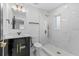 The bathroom shines with a glass-enclosed shower and modern fixtures at 3909 W Oklahoma Ave, Tampa, FL 33616