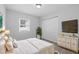 Bedroom with white walls and bed with nice decor at 3909 W Oklahoma Ave, Tampa, FL 33616