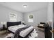 Primary bedroom featuring bed and stylish decor at 3909 W Oklahoma Ave, Tampa, FL 33616