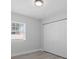 Bright bedroom with built in closet and view of the outside at 3909 W Oklahoma Ave, Tampa, FL 33616
