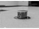 A close-up shot of a pop-up electrical outlet on the kitchen island's countertop at 3909 W Oklahoma Ave, Tampa, FL 33616