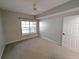 Neutral bedroom with carpet, ceiling fan, and window at 4207 S Dale Mabry Hwy # 6212, Tampa, FL 33611