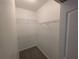 Walk-in closet with carpet floor and wire shelving at 4207 S Dale Mabry Hwy # 6212, Tampa, FL 33611