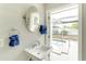 Bathroom sink with a view of the pool outside at 4362 Wesley Ln, North Port, FL 34287