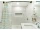 Bathroom with tiled shower, recessed niche, and modern fixtures at 4362 Wesley Ln, North Port, FL 34287