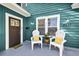 Inviting front porch with seating, perfect for relaxing outdoors at 4820 8Th S Ave, St Petersburg, FL 33711