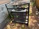 The exterior AC unit is surrounded by leaves at 5901 N 34Th St, Tampa, FL 33610