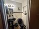 Bathroom with black fixtures, tiled walls, and classic black and white accents at 5901 N 34Th St, Tampa, FL 33610