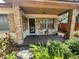 Inviting front porch with seating area perfect for enjoying the outdoors and neighborhood views at 5901 N 34Th St, Tampa, FL 33610