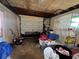 Cluttered garage featuring white door at 5901 N 34Th St, Tampa, FL 33610