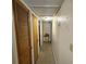 Well-lit hallway offering access to rooms, featuring clean lines and a functional layout at 5901 N 34Th St, Tampa, FL 33610