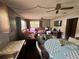 Combination living and dining area with outdated elements at 5901 N 34Th St, Tampa, FL 33610