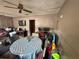 View of the combined living and dining space featuring a ceiling fan at 5901 N 34Th St, Tampa, FL 33610