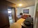Inviting living room area with furniture, with a view of an additional room at 5901 N 34Th St, Tampa, FL 33610