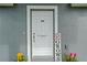 Inviting front door with colorful decorations at 6103 Fairway Dr, Ridge Manor, FL 33523
