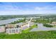 Stunning aerial view features the condo building set amidst serene waterways and lush landscaping at 6450 Shoreline Dr Dr # 9202, St Petersburg, FL 33708