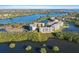 Expansive aerial view of waterfront condos amidst lagoons, waterways and natural greenery at 6450 Shoreline Dr Dr # 9202, St Petersburg, FL 33708