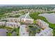 Aerial view of the condo community surrounded by lush greenery and serene waterways at 6450 Shoreline Dr Dr # 9202, St Petersburg, FL 33708