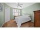 Comfortable bedroom features a shuttered window, closet, and white comforter at 6450 Shoreline Dr Dr # 9202, St Petersburg, FL 33708