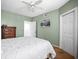 Cozy bedroom featuring a ceiling fan, neutral paint, and comfortable furnishings at 6450 Shoreline Dr Dr # 9202, St Petersburg, FL 33708