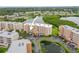 Aerial view featuring the condo building with convenient parking and attractive landscaping in a desirable location at 6450 Shoreline Dr Dr # 9202, St Petersburg, FL 33708