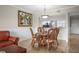 Dining area featuring an adjacent kitchen and comfortable living area at 6450 Shoreline Dr Dr # 9202, St Petersburg, FL 33708