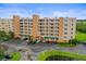 Stunning exterior of condo building with lush landscaping and convenient parking at 6450 Shoreline Dr Dr # 9202, St Petersburg, FL 33708