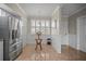 Eat-in kitchen features plenty of natural light and stainless steel refrigerator at 6450 Shoreline Dr Dr # 9202, St Petersburg, FL 33708