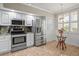 Well-lit kitchen showcases stainless steel appliances at 6450 Shoreline Dr Dr # 9202, St Petersburg, FL 33708