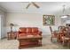 Comfortable living area with sofa and dining set, tile flooring throughout at 6450 Shoreline Dr Dr # 9202, St Petersburg, FL 33708