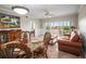 Open living area with dining table and access to outdoor balcony at 6450 Shoreline Dr Dr # 9202, St Petersburg, FL 33708