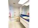 Bathroom with light walls, a combination bath and shower, and a vanity at 9578 121St St, Seminole, FL 33772