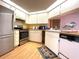 Well-equipped kitchen featuring modern appliances and hardwood floors at 9578 121St St, Seminole, FL 33772