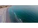 Endless ocean views meet white sands in this stunning aerial showcasing natural beauty at 11000 Gulf Blvd # 1002, Treasure Island, FL 33706