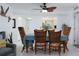 Bright dining area with seating for six and open access to the kitchen at 11000 Gulf Blvd # 1002, Treasure Island, FL 33706