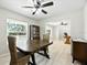 Open dining area with natural light and view of the connecting office at 11301 Donneymoor Dr, Riverview, FL 33569