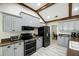 Modern kitchen featuring granite countertops and stainless steel appliances at 11301 Donneymoor Dr, Riverview, FL 33569